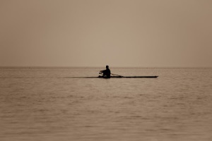 lone rower on water